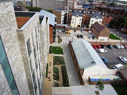 View of the landscaped flood watercourse from the roof